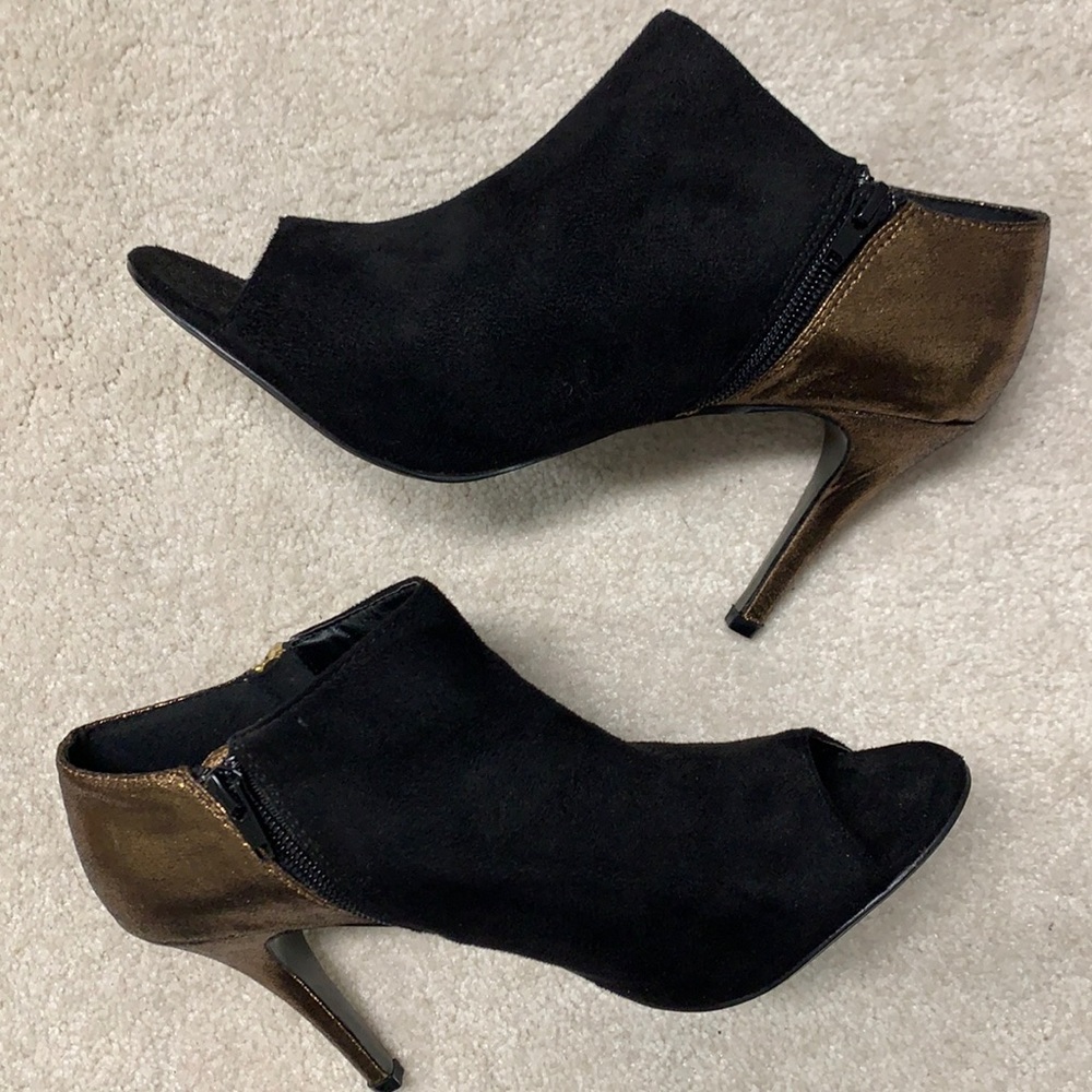 Report Women’s high heel peep toe booties.